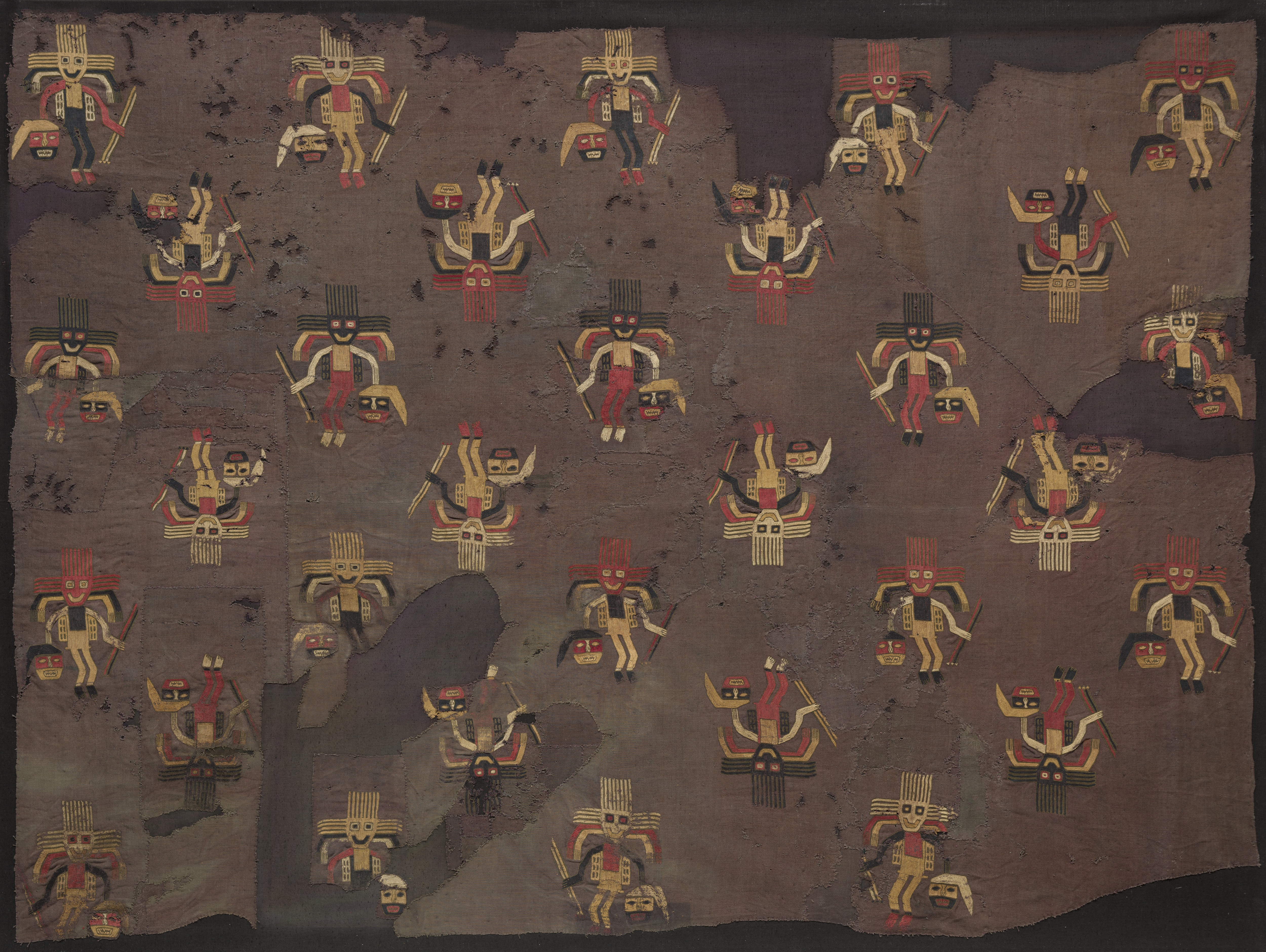 The repetition of a nonmythical figure, in this case a warrior holding spears and a trophy head, was one of the important innovations of Paracas textile design during the Late Paracas period. The trophy head cult was an essential aspect of crop fertility and was, therefore, a focal point of Paracas art in general. The repetition of a nonmythical figure, in this case a warrior holding spears and a trophy head, was one of the important innovations of Paracas textile design during the Late Paracas period. The trophy head cult was an essential aspect of crop fertility and was, therefore, a focal point of Paracas art in general.